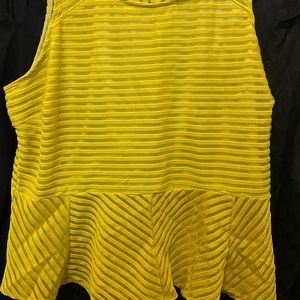 Ashley Stewart size 26/28. Yellow peek-a-boo, peplum shirt